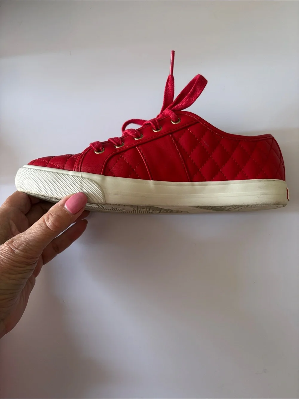 GUESS size 7.5 red quilted leather Sneakers with Gold Hardware very good shape